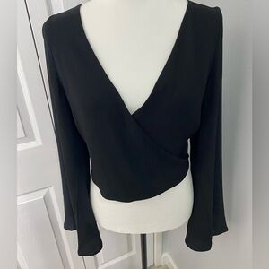 Open back flirty top